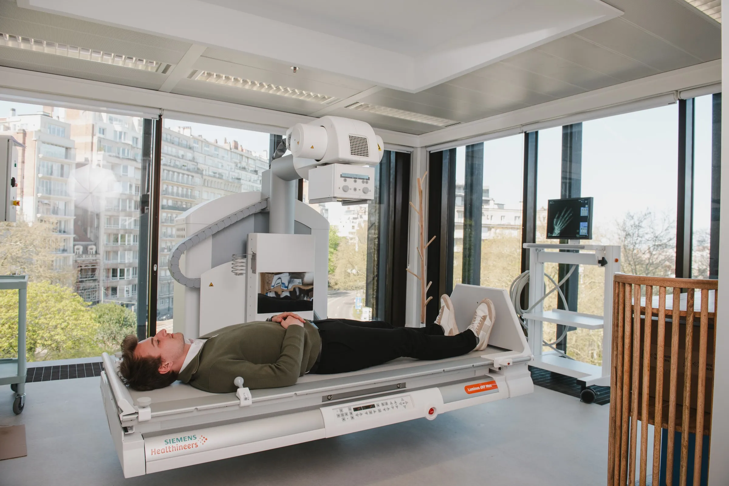 Patient positioned on the radiography table in the RX room